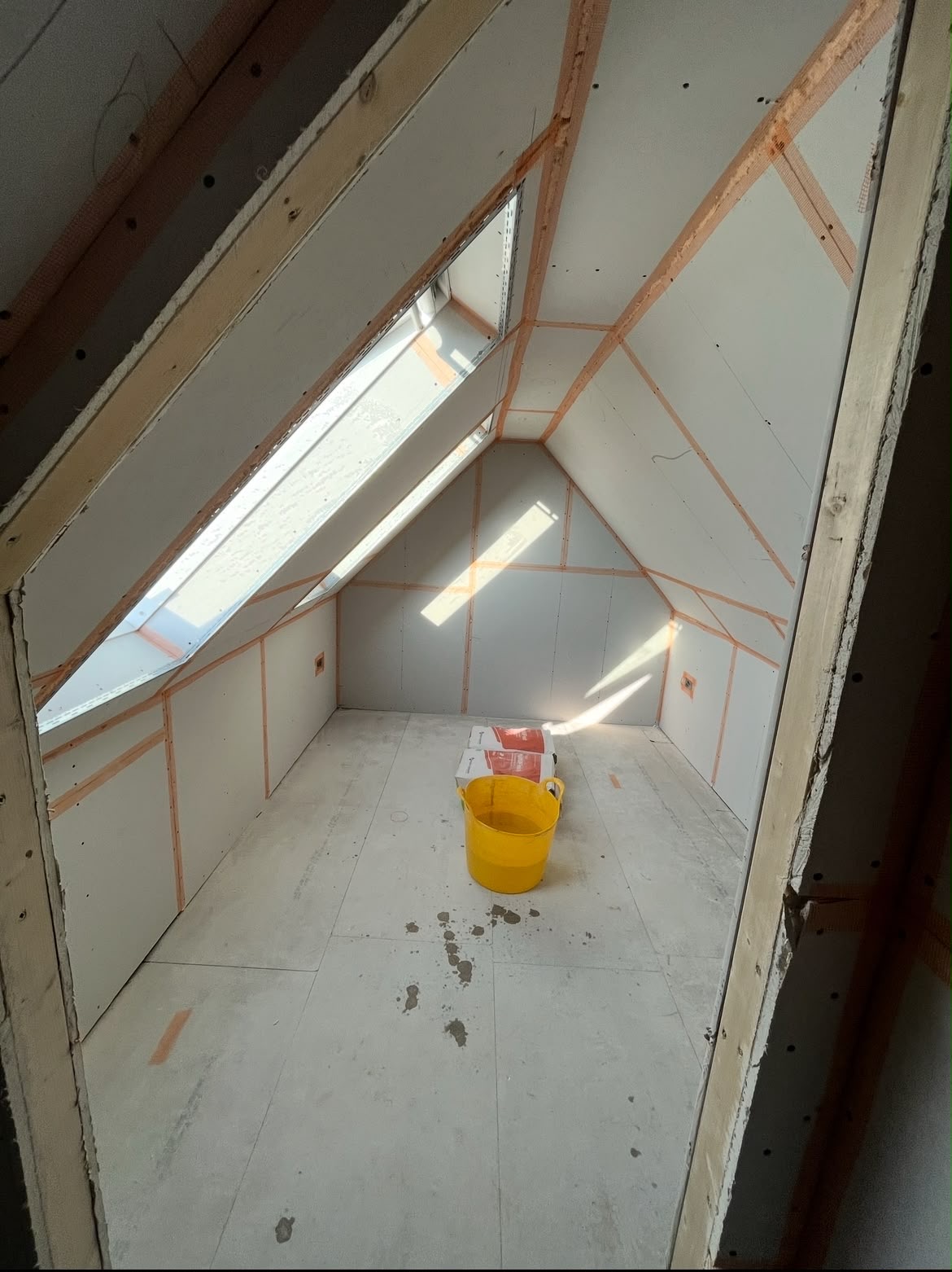 Loft room plasterboard fitted and prepared ready for plastering